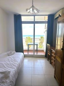 Postel nebo postele na pokoji v ubytování Barraca Suites