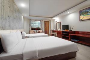 TV a/nebo společenská místnost v ubytování BIDV Beach Hotel Nha Trang
