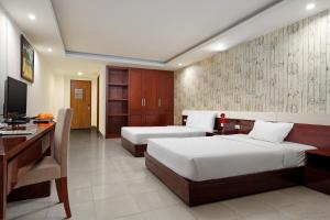 TV a/nebo společenská místnost v ubytování BIDV Beach Hotel Nha Trang