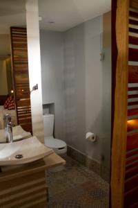 Koupelna v ubytování Hotel Helverica