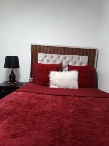 En eller flere senger på et rom på Aparta estudio en santiago #1