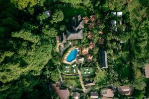 an overhead view of a house with a swimming pool at Railay Phutawan Resort in Railay Beach