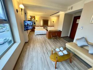 Sjónvarps- og/eða afþreyingartæki á Tian Long Hotel