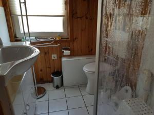 Ένα μπάνιο στο Lovely apartment in Extertal