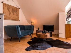 Μια τηλεόραση ή/και κέντρο ψυχαγωγίας στο Holiday apartment in Otseebad Wustrow