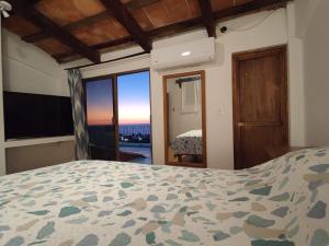 Postel nebo postele na pokoji v ubytování Casa Rey Sol Vallarta + 37 fotografií