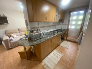 Kuchyň nebo kuchyňský kout v ubytování E041 Apartment Albir