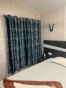 Postel nebo postele na pokoji v ubytování Sydney X Huts