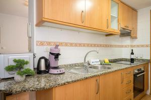 Kuchyň nebo kuchyňský kout v ubytování E041 Apartment Albir