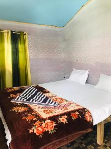 Posteľ alebo postele v izbe v ubytovaní Sydney X Huts