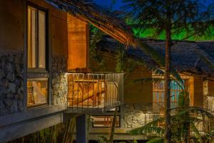 Balkón nebo terasa v ubytování Sapaxa Spring Garden Ecolodge