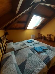 Ένα ή περισσότερα κρεβάτια σε δωμάτιο στο CASA OSO 1
