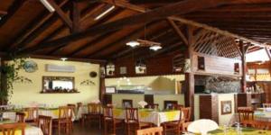 Reštaurácia alebo iné gastronomické zariadenie v ubytovaní Agriturismo Ghiritina