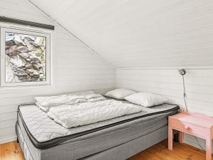 Ένα ή περισσότερα κρεβάτια σε δωμάτιο στο 10 person holiday home in Lindesnes-By Traum