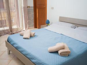 Postel nebo postele na pokoji v ubytování Isola delle Femmine - Casetta del Pescatore