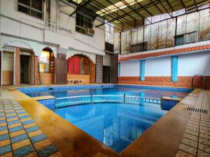 Bazén v ubytování Hotel Pratap Heritage nebo v jeho okolí