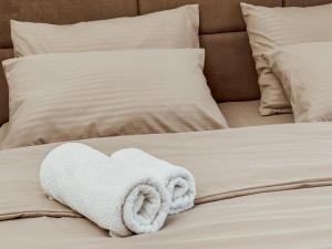 Postel nebo postele na pokoji v ubytování Kiko apartmani LUX