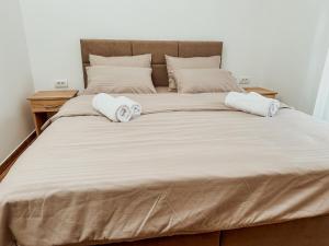 Postel nebo postele na pokoji v ubytování Kiko apartmani LUX