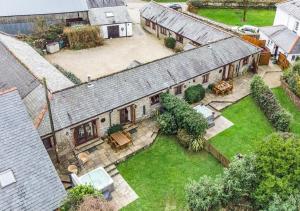 an aerial view of a house with a yard at Oriel Cottage in Bittadon
