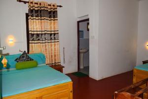 Voodi või voodid majutusasutuse White Villa Hotel toas