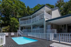 an image of a house with a swimming pool at Hide-Away Guest House in Knysna