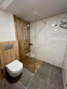 Koupelna v ubytování LEMAS SUITE HOTEL