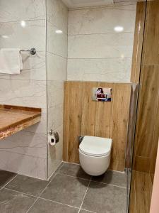 Koupelna v ubytování LEMAS SUITE HOTEL