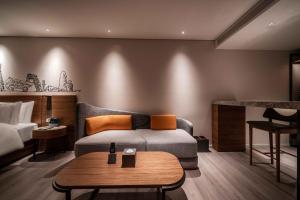Letto o letti in una camera di UrCove by Hyatt Shanghai Lujiazui Expo Center