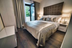 Posteľ alebo postele v izbe v ubytovaní CASA V BENCUN Luxury Apartments