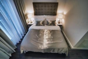 Posteľ alebo postele v izbe v ubytovaní CASA V BENCUN Luxury Apartments