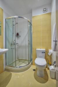 Koupelna v ubytování Апартамент на плаж Градина + 7 fotografií