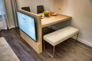 Televízia a/alebo spoločenská miestnosť v ubytovaní CASA V BENCUN Luxury Apartments