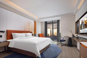 โทรทัศน์และ/หรือระบบความบันเทิงของ Hampton by Hilton Shenzhen Futian Huaqiangbei