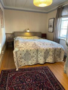 Postel nebo postele na pokoji v ubytování Prästgatanett Apartments