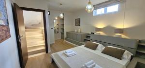 Postel nebo postele na pokoji v ubytování VK Milna