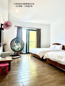 Postelja oz. postelje v sobi nastanitve Nanwan254 Homestay