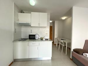 Kuchnia lub aneks kuchenny w obiekcie Apartamentos Bernat 3000