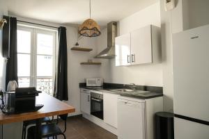 Køkken eller tekøkken på La Cour Des Senteurs / F2 Château de Versailles