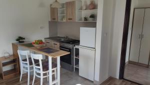 Kuchyňa alebo kuchynka v ubytovaní Plitvice Glock Apartment