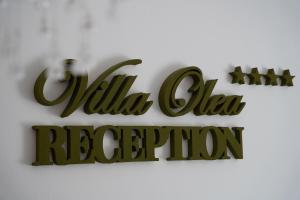 un cartello che legge la reception di Villa de la Reporia di Villa Olea a Šimuni
