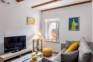 Televízia a/alebo spoločenská miestnosť v ubytovaní Apartment Martin