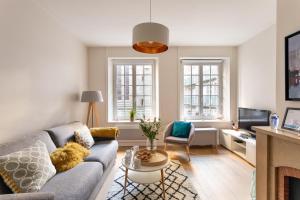 TV a/nebo společenská místnost v ubytování Chez Léon - Appt à 500m des plages