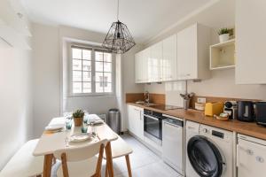 Kuchyň nebo kuchyňský kout v ubytování Chez Léon - Appt à 500m des plages