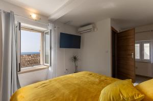 Posteľ alebo postele v izbe v ubytovaní Apartment Martin
