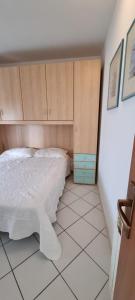 Postel nebo postele na pokoji v ubytování Attico Super Panoramico