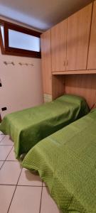 Postel nebo postele na pokoji v ubytování Attico Super Panoramico