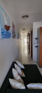 Postel nebo postele na pokoji v ubytování Attico Super Panoramico