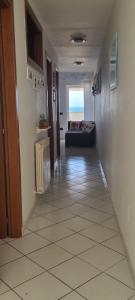 Postel nebo postele na pokoji v ubytování Attico Super Panoramico