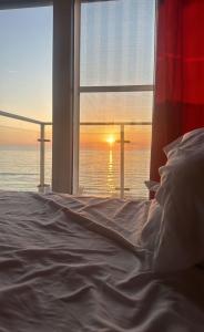 Postel nebo postele na pokoji v ubytování holiday shengjin kune