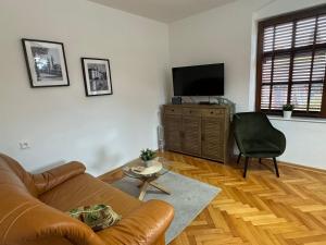 Televízia a/alebo spoločenská miestnosť v ubytovaní Kutna Hora perfect apartment